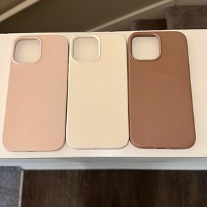 Set of 3 silicone iPhone 12/13 pro max cases. Pink sand, cream, and brown.